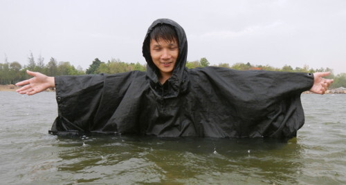 Poncho survival swimming